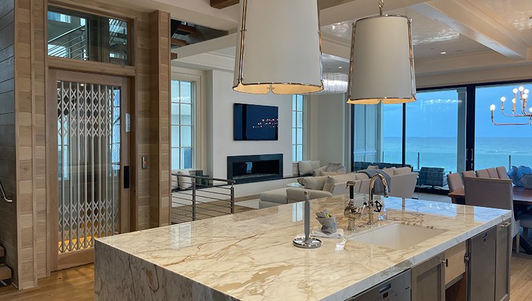 Elevator behind a kitchen island