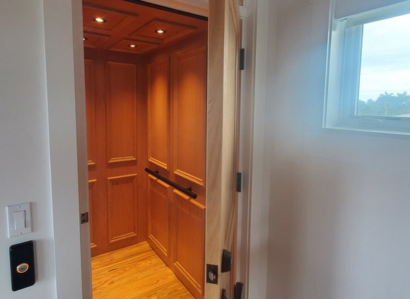 Door opening revealing a beautiful elevator