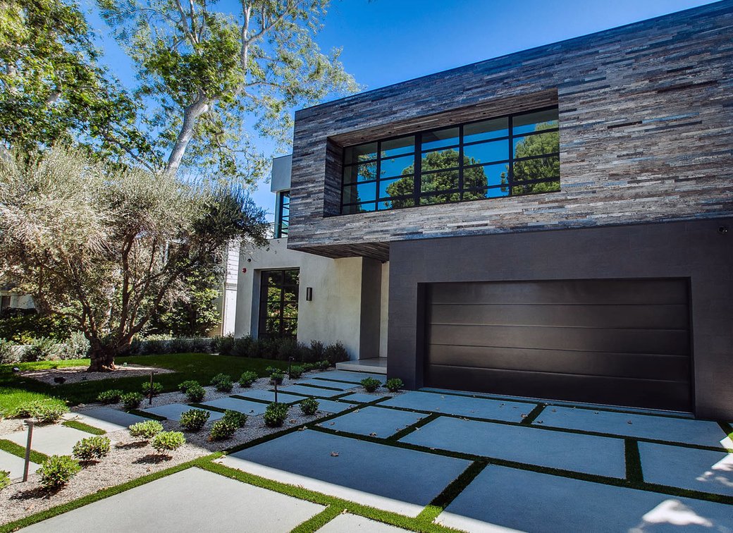 Two story modern stone home