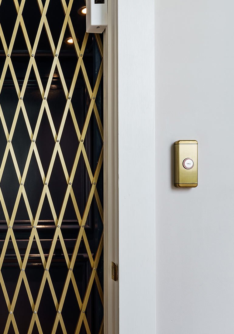 Gold gate and call button of a home elevator
