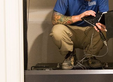 home elevator technician diagnostics maintenance laptop